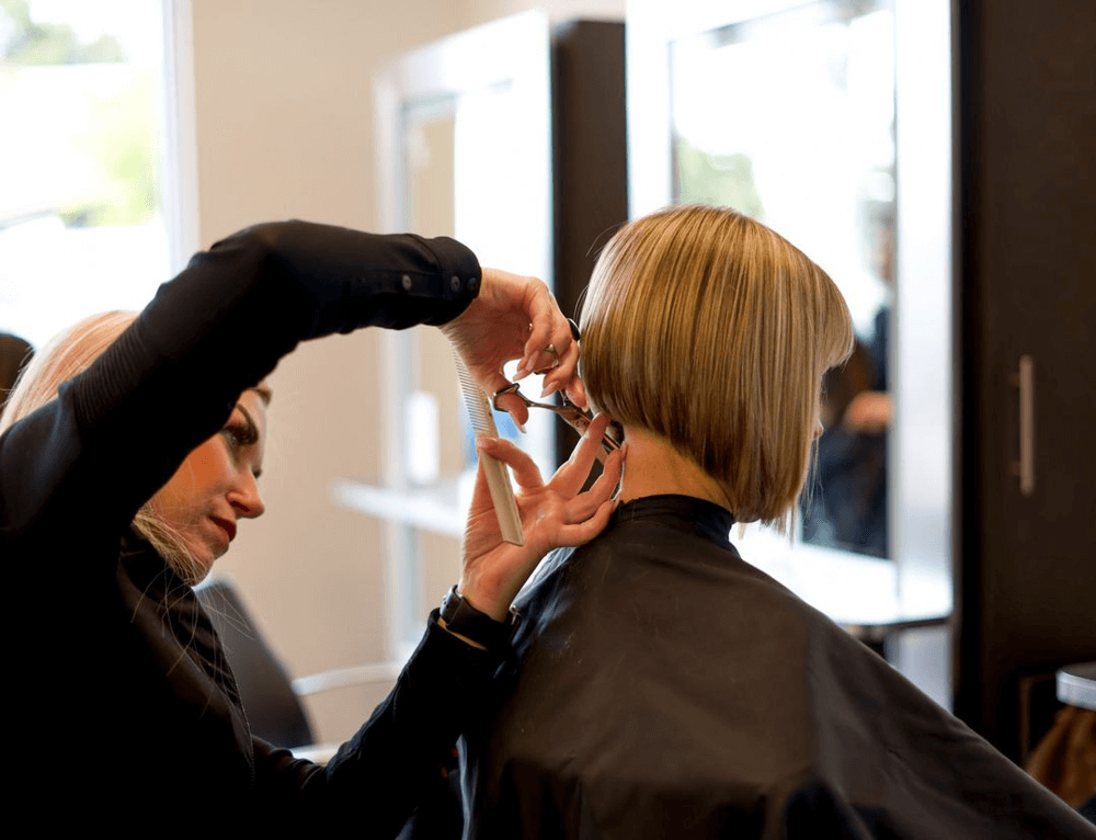 staff cutting hair